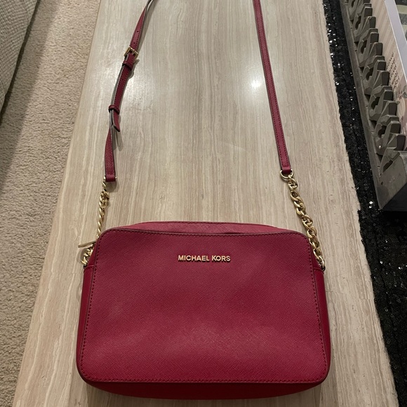 Michael Kors red purse and wallet sold as set. Slightly used. - Picture 2 of 6